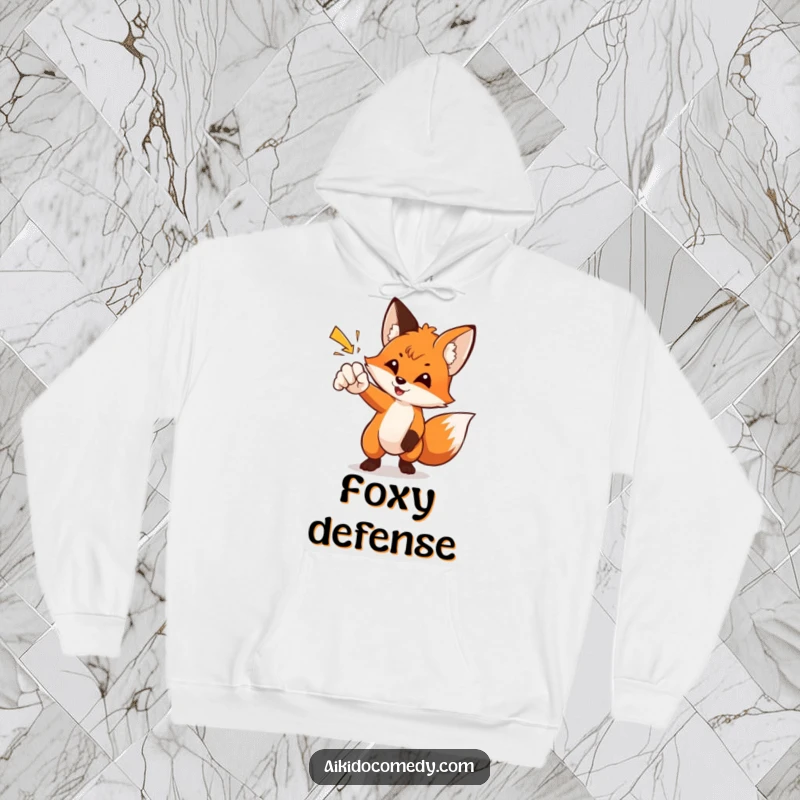 Funny fox in martial arts pose, deflecting a punch on a hoodie. Cozy and clever funny gift.