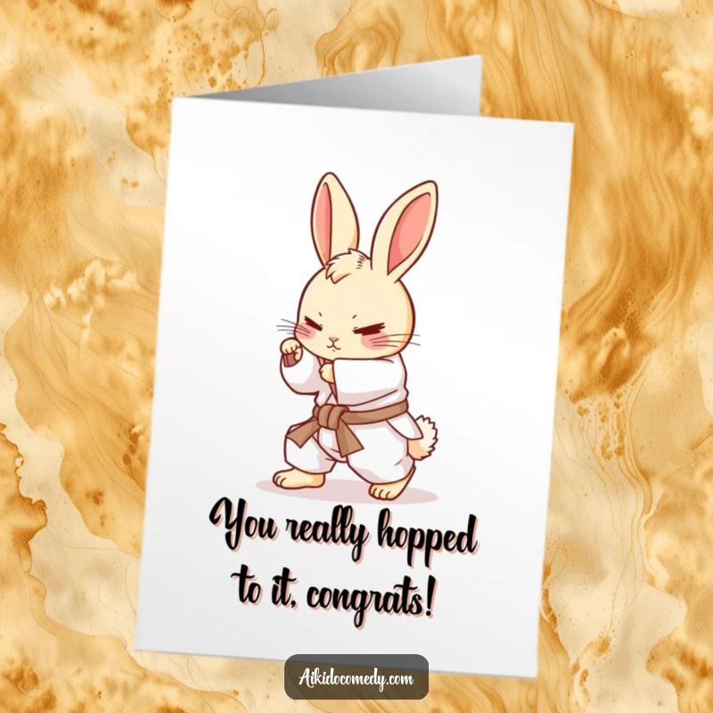 Funny Free Printable Congratulations Card showing a determined bunny in a white gi, executing a perfect rolling motion.