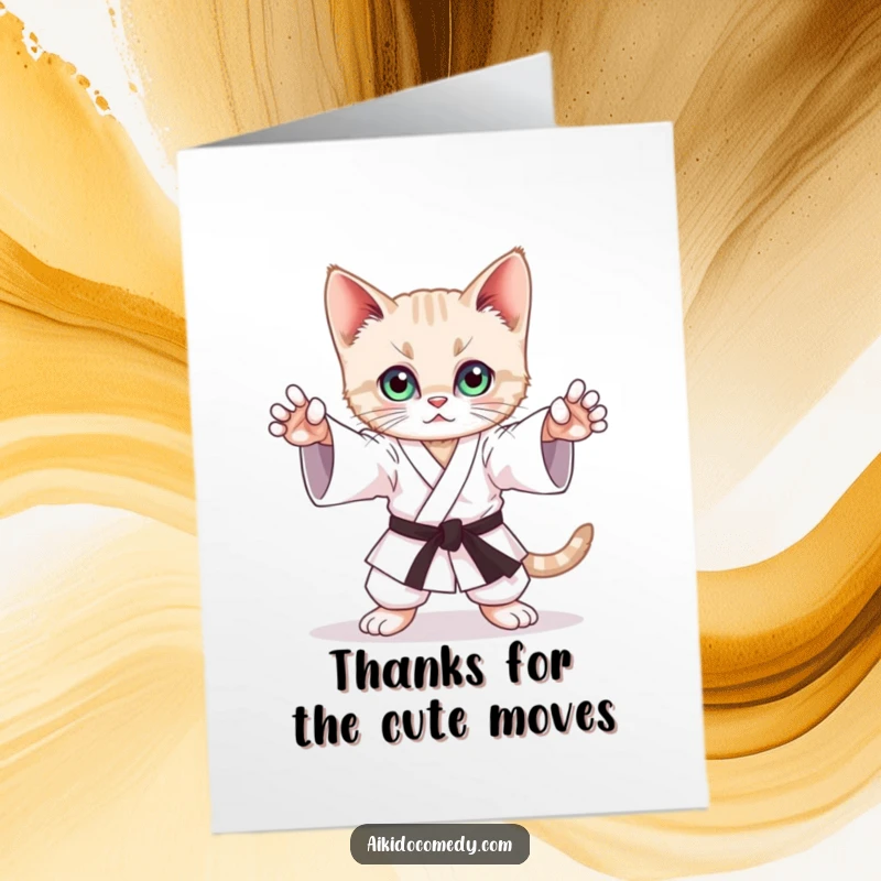 Funny Free Printable Thank You Card of a playful kitten mimicking a graceful Aikido stance with captivating, focused eyes.